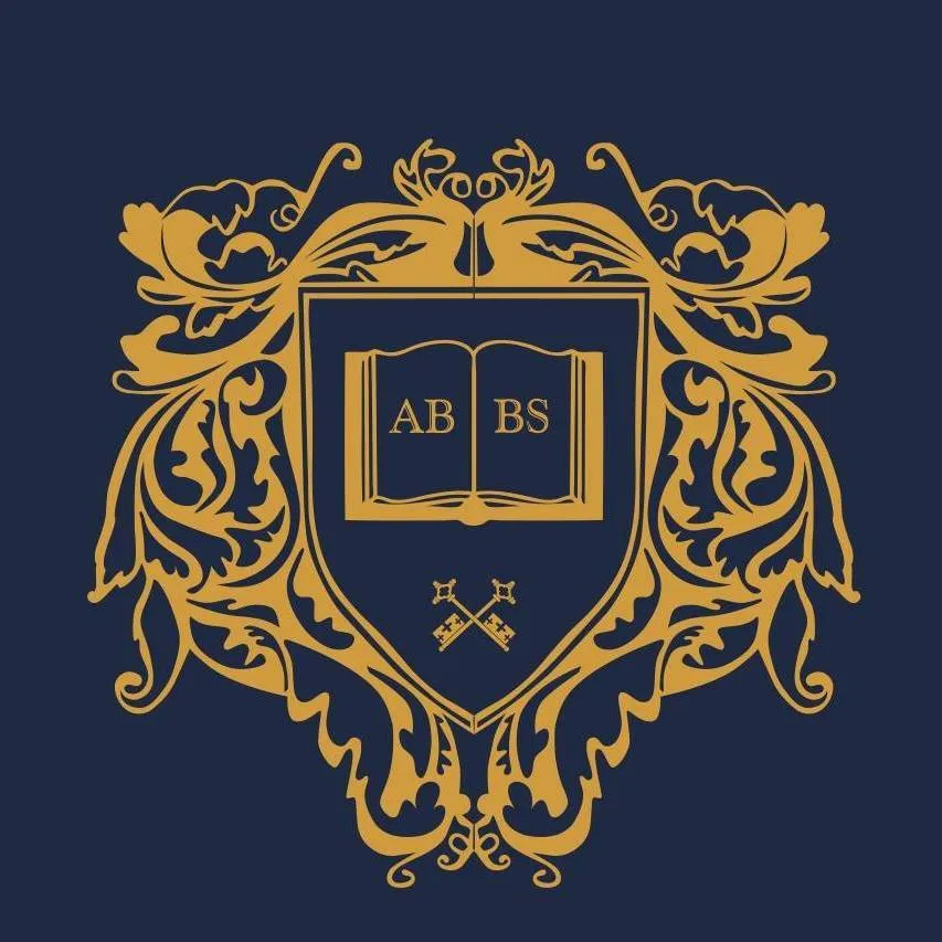 مدرسة البسمة البريطانية Logo